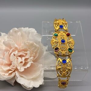 Vintage brushed gold bracelet with multiple colored cabochon stones